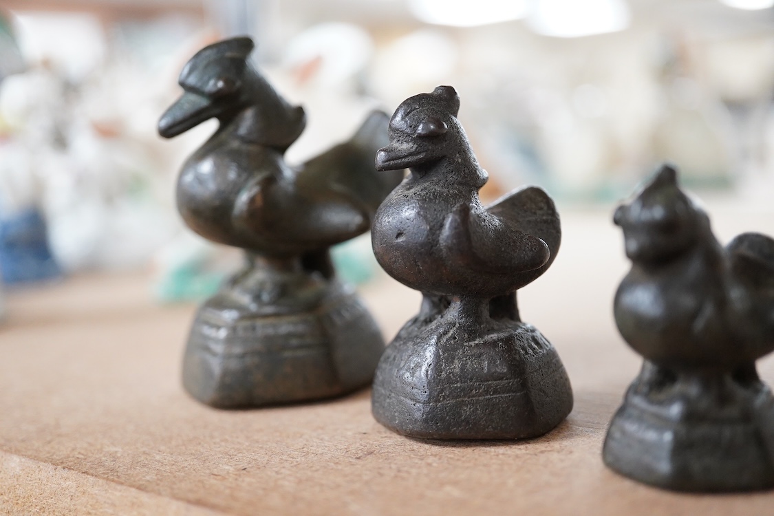 A graduated set of six Burmese bird opium weights, 7cm high